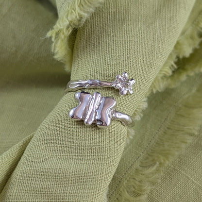 Butterfly with flower ring adjustable to size N-P